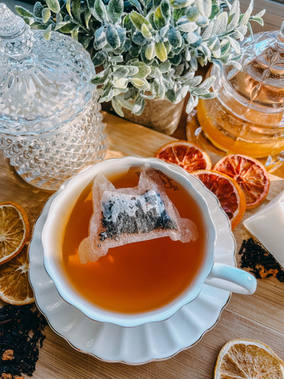 Cat Peeking Over Shaped Tea Bags